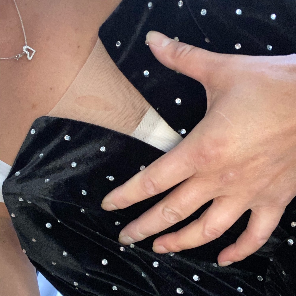 Mini velvet dress with rhinestone detail.